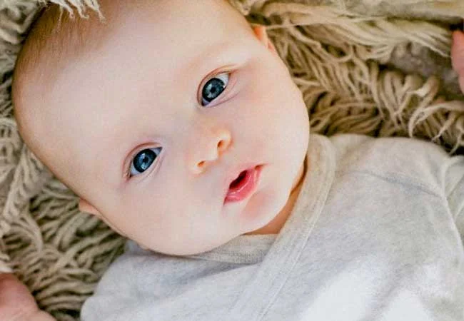 Baby tilting head to shoulder teething