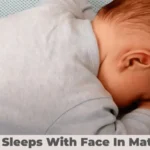 Baby Sleeps with Face in Mattress